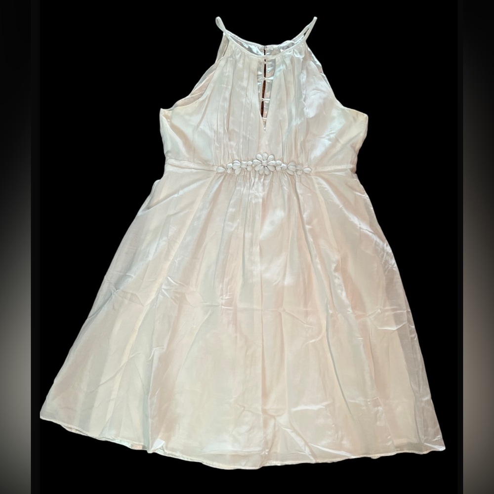 White silk & cotton dress with beautiful embellishment in the front.